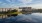 a body of water with buildings along it