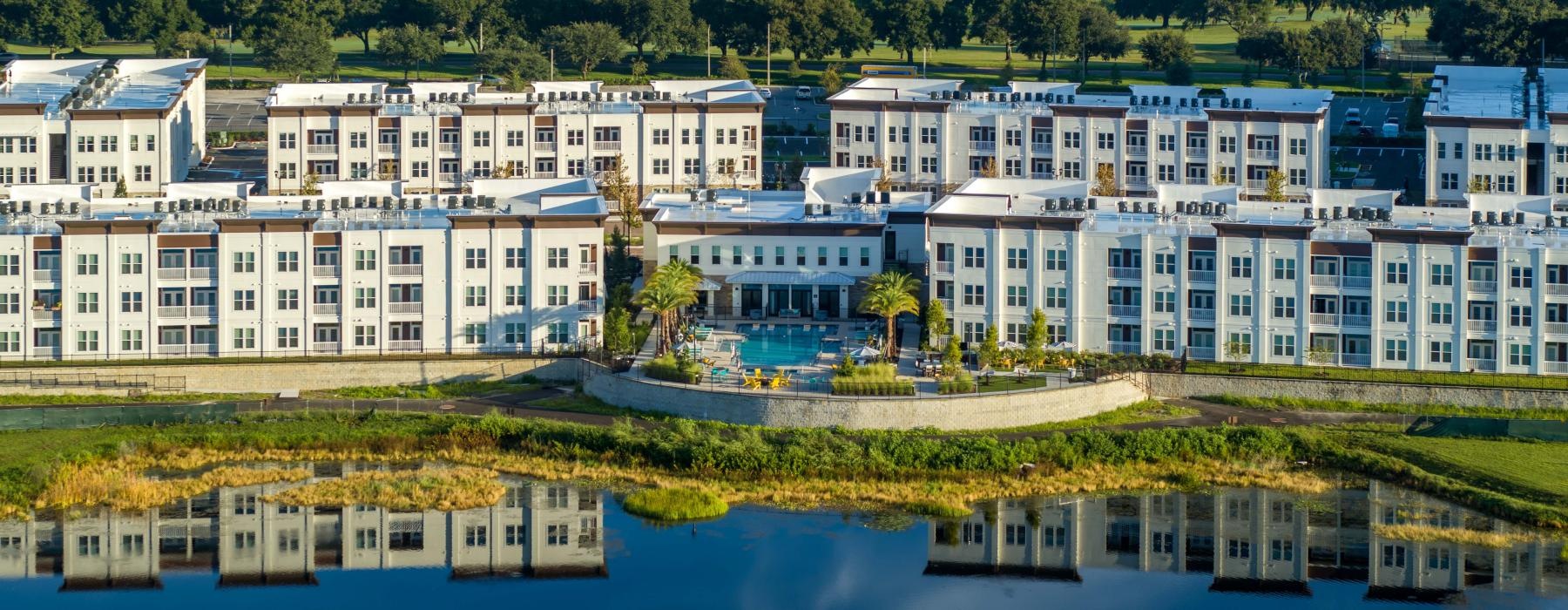 a body of water with buildings along it