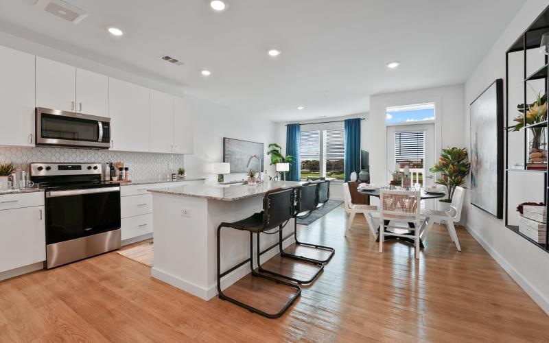 a kitchen with white cabinets