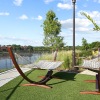 a playground with a body of water in the background