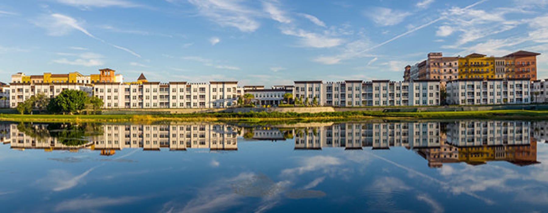 a body of water with buildings along it
